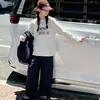 Conjunto de chaleco estilo coreano para niñas, nueva colección otoño 2026, conjunto moderno de tres piezas para niños mayores, que incluye una camiseta base y pantalones de trabajo de pierna ancha