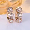 Populares Europeos y Americanos Oro Champagne y Diamante Blanco Tres Redondas Completamente Diamantadas Exquisitas Chapado en Cobre Oro Real Versátiles Elegantes Pendientes Venta al por Mayor
