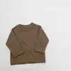 Camiseta Básica Versátil de Manga Longa com Gola Redonda para Bebês na Primavera e Outono Novas Blusas Casuais para Bebês Masculinos e Femininos Camisa de Base Macia e Sedosa