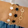 Pulsera de Trébol de Cinco Hojas con Incrustaciones de Diamantes de Aleación de Moda Transfronteriza Europea y Americana Joyería Set de Tres Piezas Pulsera Geométrica Simple Lisa Venta al por Mayor