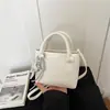 Bolso de mano de alta gama para mujer, modelo nuevo 2026, bolso de hombro y cruzado súper popular, bolso tote pequeño exquisito, bolso tipo cubo versátil