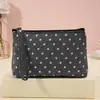 Bolsa de maquillaje fresca y sencilla con estampado de lunares para mujer, versión coreana, neceser con cremallera engrosada, bolsa de almacenamiento de cosméticos portátil para viajes