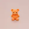 Mini adornos de dibujos animados tridimensionales accesorios DIY oso en posición sentada nuevo al por mayor oso de dibujos animados tridimensional accesorios de resina