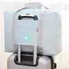 Bolsa organizadora de roupas à prova d'água, portátil, de grande capacidade, para armazenamento de viagem, mala de rodinhas multifuncional para empacotar e mudar de dormitório