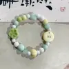 Fabricantes fornecem pulseira de cachorro de cerâmica design de nicho pulseira novo chinês fofo ossos de cachorro contas divertidas