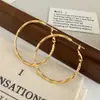 Moda Europeia e Americana Simples Luxo Leve High-End Brincos de Círculo com Textura Geométrica Versátil para o Dia a Dia Brincos de Temperamento de Nicho para Mulheres