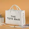 Bolsa Feminina de Couro PU Lisa Nova Atacado Transfronteiriça, Bolsa Tote Casual Simples com Letras, Bolsa Transversal Grande Capacidade, Bolsa de Ombro
