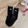 Calcetines de longitud media con volantes estilo coreano, calcetines de algodón holgados de color liso, nuevo producto de otoño, calcetines versátiles de encaje dulce para mujer