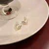 Pendientes de Plata de Ley S925 con Aguja de Plata de Corea del Sur Perla Hojas Pequeñas Otoño e Invierno para Mujer 2024 Nuevos Pendientes de Botón de Diseño de Nicho de Moda de Alta Calidad