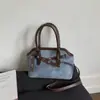 Bolso Pequeño Retro de Moda Transfronterizo 2026 Estilo Nuevo Bolso Cruzado Versátil de Gama Alta para Mujer Bolso de Mano para el Viaje Diario
