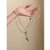 Collar Largo de Plata con Flor de Cuchara Coreana y Perlas para Mujer, Moderno y de Alta Gama, Accesorio de Cadena para Suéter Versátil de Nicho Tendencia
