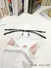 Nuevo modelo de montura de gafas de aleación TR ultraligera con borde cortado, montura de gafas elegante para miopía y presbicia, montura de gafas para hombre E50
