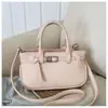 Moda Primavera 2026 Versátil Bolsa de Mão Elegante e Moderna Bolsa de Ombro Transversal com um Toque Vintage de Alto Padrão