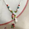 Collar con colgante de campana de mariposa de cerámica de estilo étnico retro para mujer, diseño nuevo y moderno, cadena larga para suéter, accesorios
