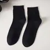 Calcetines de algodón para hombre, calcetines de caña media, otoño e invierno, negocios casual, algodón puro, primavera y otoño, calcetines para hombre, color liso, empaque individual, calcetines de algodón para cuatro estaciones