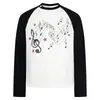 Camiseta de algodón ligera, manga raglán en blanco y negro, botones diagonales, manga larga, desgastada, con patrón de nota musical y estrella roja, estilo casual americano, corte ajustado