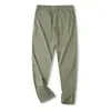 Pantalones deportivos transpirables elásticos de secado rápido para hombre 3144