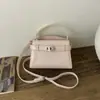 Bolso Kelly de Gama Alta con Hebilla de Cierre de Patrón de Cocodrilo para Mujer Modelo Nuevo 2025 Versátil para Viajes Diarios Bolso de Hombro Cruzado Pequeño Cuadrado Bolso de Mano