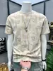 Nueva Camiseta de Verano de Manga Corta para Hombre 2026, Estampado Floral Delgado, Bloques de Color a la Moda, Top Suelto Versátil de Manga Media con Cuello Redondo