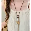 ¡Estilo de dinero chino antiguo! Collar colgante marrón para mujer, de alta gama, lujo ligero, cadena de clavícula de nicho, accesorio largo para otoño e invierno