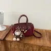 Otoño 2026 Nueva Moda Estilo Dulce Simple Bolso Kelly con Patrón de Lichi Bolso de Mano para Mujer Estilo Coreano Bolso de Hombro Único para el Trabajo