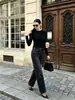 Top de punto plisado de cuello redondo transfronterizo, colección otoño 2026, capa interior elegante, camiseta básica de manga larga de color liso, moda femenina de alta gama