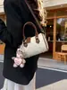2026 Nuevo Bolso de Hombro Cruzado de Moda de Alta Gama Diseño de Nicho Boston de Viaje en Relieve para Mujer