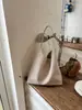 Bolso de axila de alta gama transfronterizo para mujer, nuevo modelo 2026, patrón tejido, moda retro, bolso de hombro, gran capacidad, bolso para madre e hija
