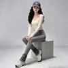 Conjunto deportivo de yoga de secado rápido para mujer, con un top de manga larga protector del sol y pantalones deportivos elásticos y transpirables, un atuendo versátil para el día a día