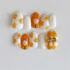 Sp-307 Patrón Naranja 10 Piezas Fototerapia Hechas a Mano Uñas Portátiles Flor Fresca Linda Verano Arte de Uñas Piezas de Uñas Venta al por Mayor