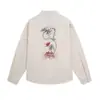 Marca de moda popular, camisa de manga larga con estampado "Beyond the Flowers", holgada y casual, adecuada para primavera y otoño, estilo masculino, camisa con cuello estilo japonés