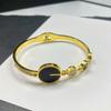 Pulsera europea y americana simple de acero de titanio chapado en oro de 18 quilates con micro incrustaciones de circón colorido de diamante completo, pulsera de moda ins para mujer en stock al por mayor