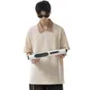 Camiseta de retazos a cuadros de color contrastante simple de manga corta para hombre y mujer, estilo nuevo de verano 2026, camiseta de media manga con cuello polo