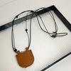 2024 nuevo mini bolso media luna collar ajustable sentido del diseño de moda accesorios para usar colgando del cuello bolso pequeño cadena para suéter