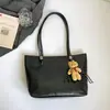 Bolsa Tote Grande Capacidade para Mulheres Outono/Inverno 2026 Cor Sólida Bolsa de Ombro Único Bolsa Simples para Trabalho e Deslocamento Bolsa de Mão ou de Ombro