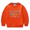 Suéter de cuello redondo de manga larga para niños y niñas, ropa de estilo coreano con dibujos animados de primavera y otoño de 2023, de algodón, para bebés, pequeños y medianos.