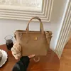 Bolsa de mensajero vintage de alta calidad para mujer, nuevo modelo 2026, bolso de hombro elegante de gran capacidad, bolso de mano tipo tote para el trabajo