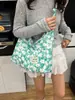 Bolsa de lona de gran capacidad para mujer, nuevo modelo 2026, estilo commuter de alta gama, estampado floral dulce, bolso tote de un solo hombro para llevar debajo del brazo