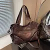 Bolsa tote de grande capacidade com design minimalista retrô de nicho, nova coleção outono 2026, estilo biker para o dia a dia, de ombro e crossbody