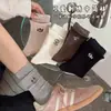 Calcetines bordados de dibujos animados para mujer, otoño e invierno, estilo preppy, de longitud media hasta la pantorrilla, estilo japonés con bordes enrollados, con lindos diseños de letras y cachorros, sin costuras y afelpados