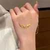 Nuevo Collar Entrelazado Hielo Triturado Dorado para Mujer, Cadena para Clavícula con Colgante de Doble Anillo Super Brillante de Nicho de Lujo Ligero de Gama Alta