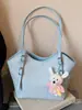 Bolsa Feminina 2026 Nova Primavera/Verão de Axila de Alto Padrão Exquisite para o Dia a Dia Bolsa de Ombro Único Bolsa Tote Tecida de Grande Capacidade