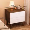 Mesita de noche de madera maciza para dormitorio del hogar 2026 Venta caliente Creativa Pequeño Armario de almacenamiento simple para niños Mesita de noche de tronco