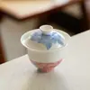 Estilo Dinastía Tang y Song Arcilla de Jade Porcelana Azul y Blanca Peonía Elegante Cerámica para el Hogar Gaiwan Juego de Té Kung Fu Taza de Té Gaiwan de Pared Delgada