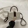 Bolso de mano pequeño elegante de alta gama para mujer, nuevo bolso cruzado de moda versátil 2026, bolso de hombro tipo silla de montar sensación popular de internet