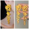 Pendientes largos con borlas de flores doradas de alta calidad, ligeros y de lujo, elegantes y a la moda, nuevos
