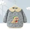 Babero de terciopelo de cristal para bebé, impermeable, antidesgaste, con bolsillo de arroz, para otoño e invierno, delantal para madre y bebé.