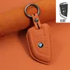 Aplicável à bolsa de chaveiro de couro bovino de primeira camada da série 3 1 série i3 3 série 5 série 530 carro x1 concha x3 5 série x5 lâmina ix3