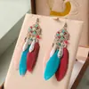 Pendientes de Pluma de Hoja de Loto Multicapa Estilo Étnico Aleación Casual Pendientes de Yunnan Venta al por Mayor Pendientes de Joyería Étnica Creativa