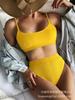 Traje de baño dividido nuevo 2025 para mujer, bikini sexy de color sólido europeo y americano, traje de baño cruzado de cintura alta, venta al por mayor de bikini
